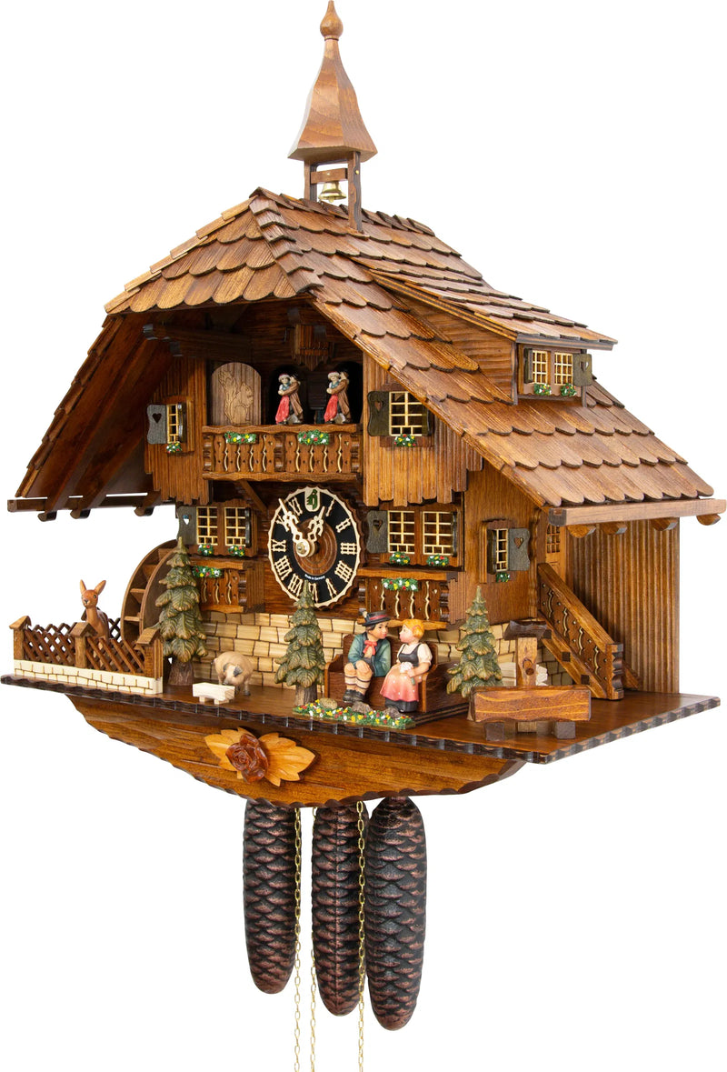 KU838M - 8 Day Musical Chalet with Kissing Couple