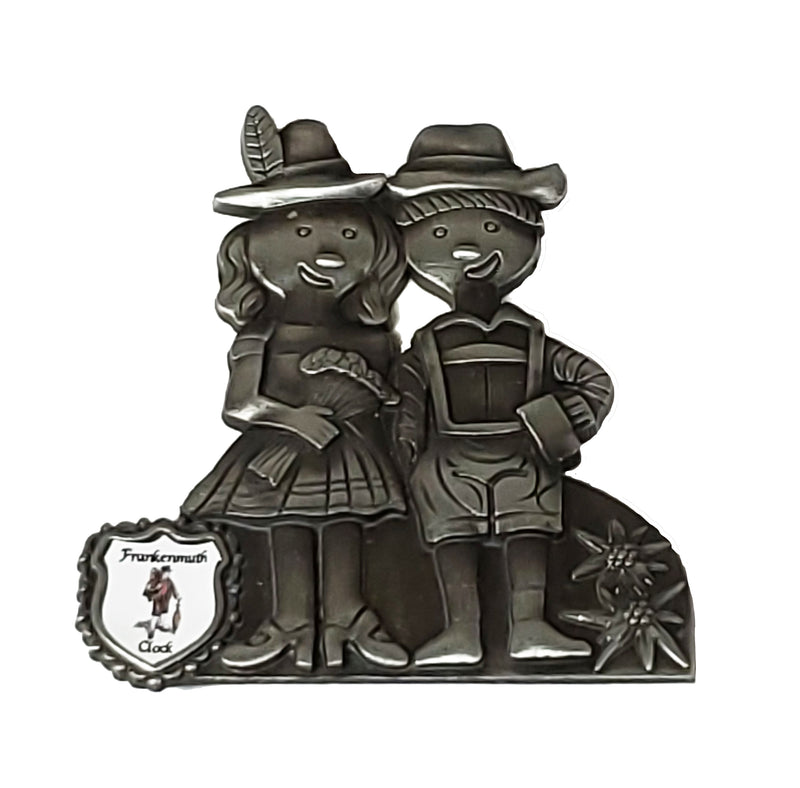 0013B - Magnet w/Girl and Boy with Clock Company Crest